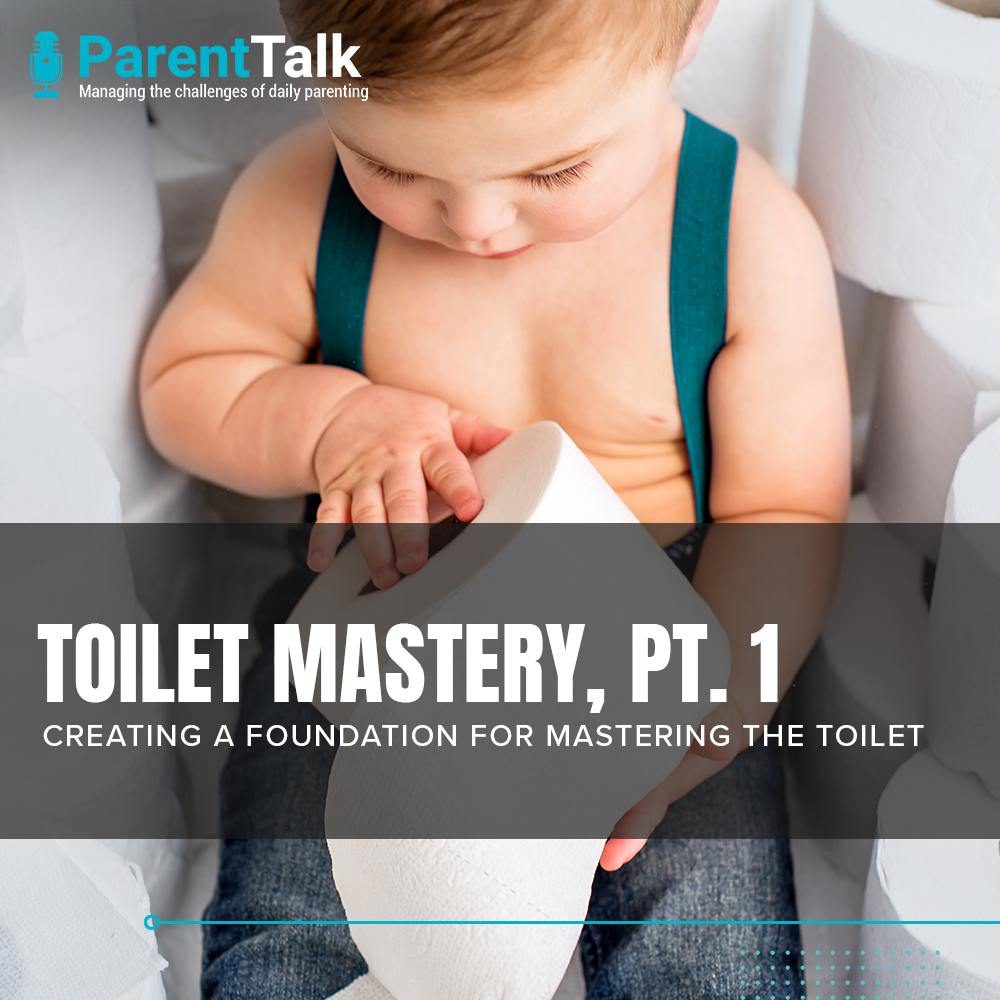 An infant sits on a toilet and plays with toilet paper.