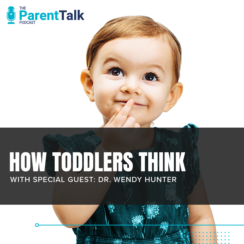 How toddlers think. A child holds a finger to her chin, grinning and thinking.